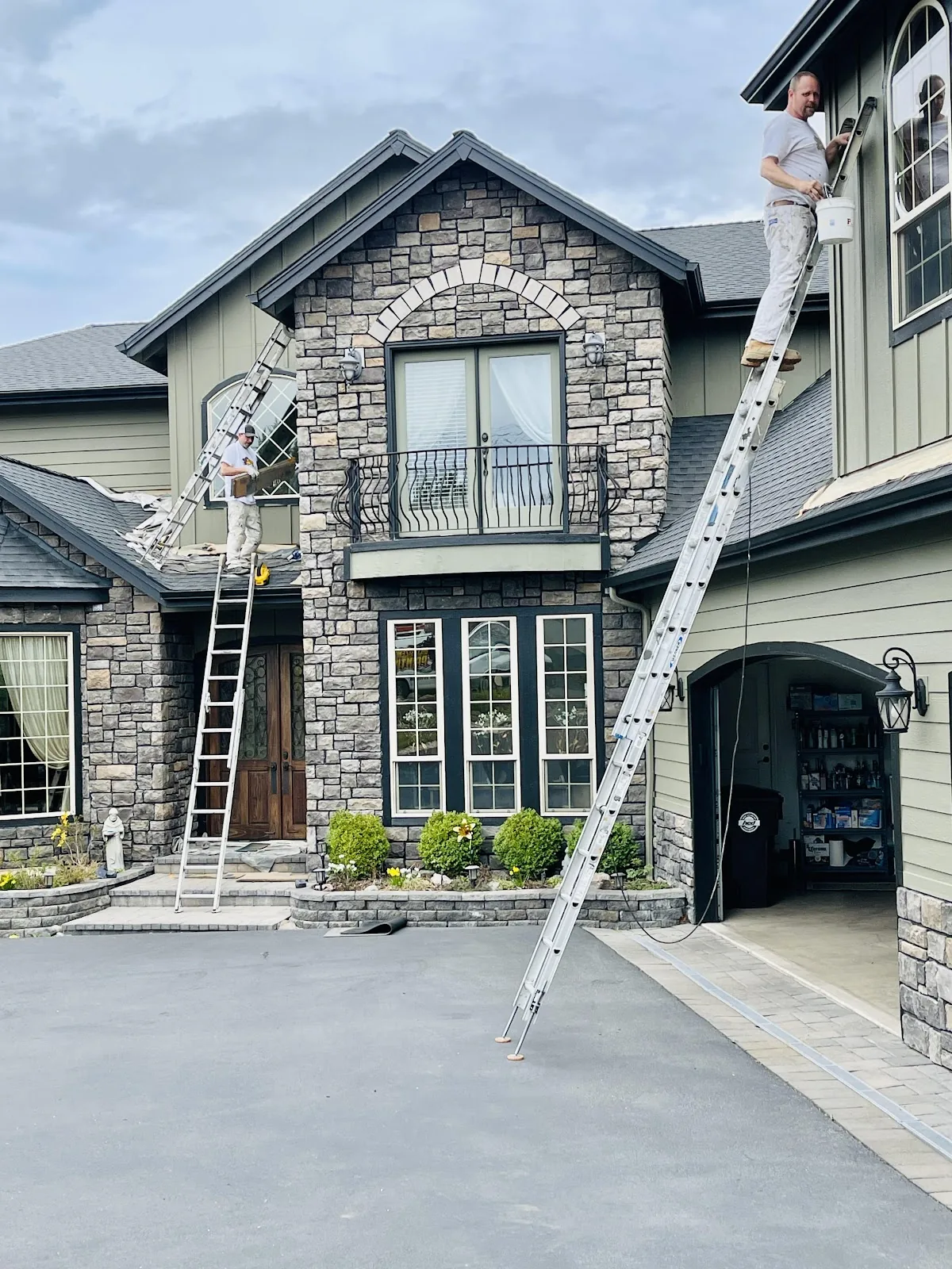 Bill Sizemore Painting crew repainting a home in Central Oregon